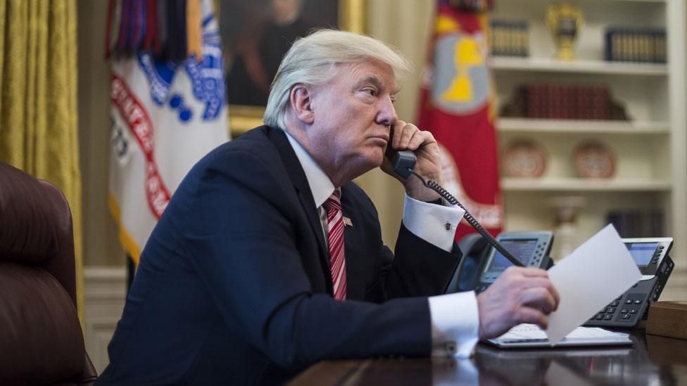  108966166 Trump2 Phone976getty